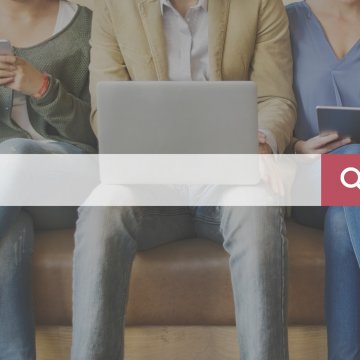 truthfinder online background check services plans pricing search bar people with laptops and phones in the background